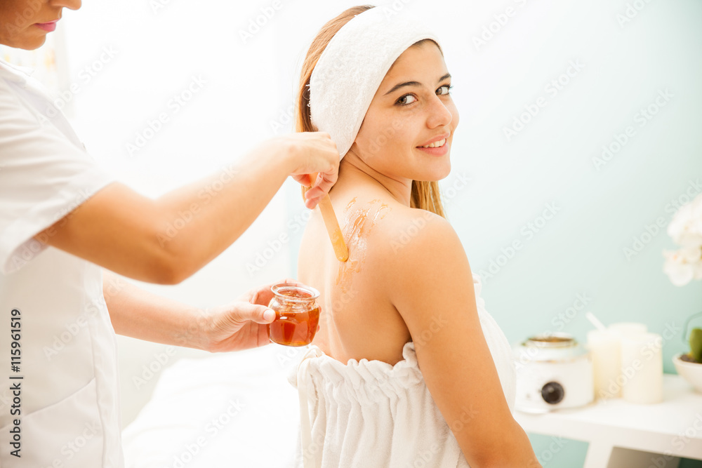 Cute woman with honey on her back Cute woman with honey on her back