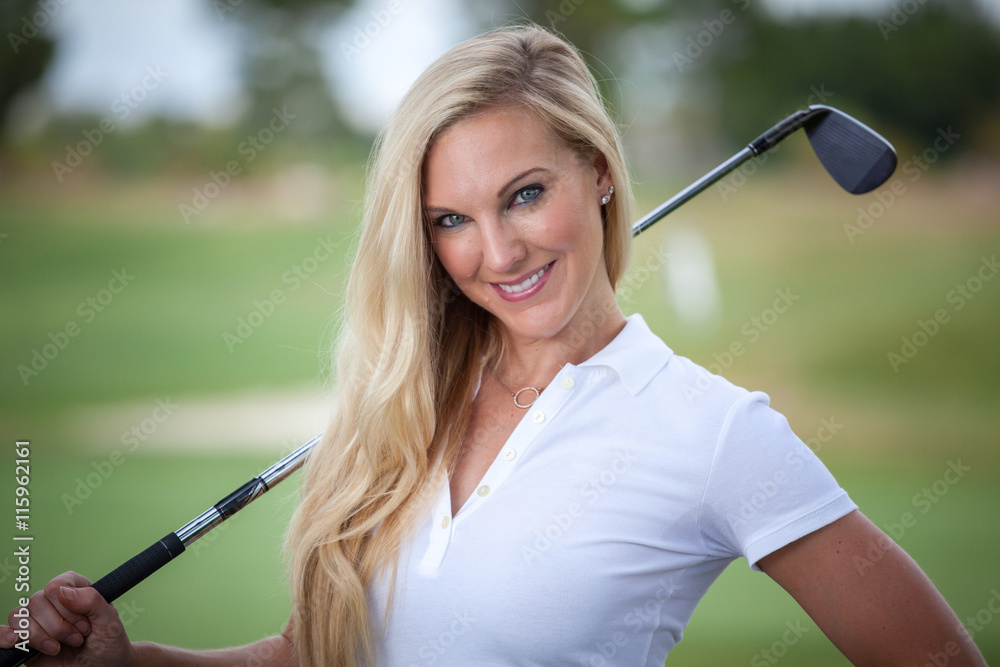 Beautiful woman golf caddy on course with club Stock 写真 Adobe Stock