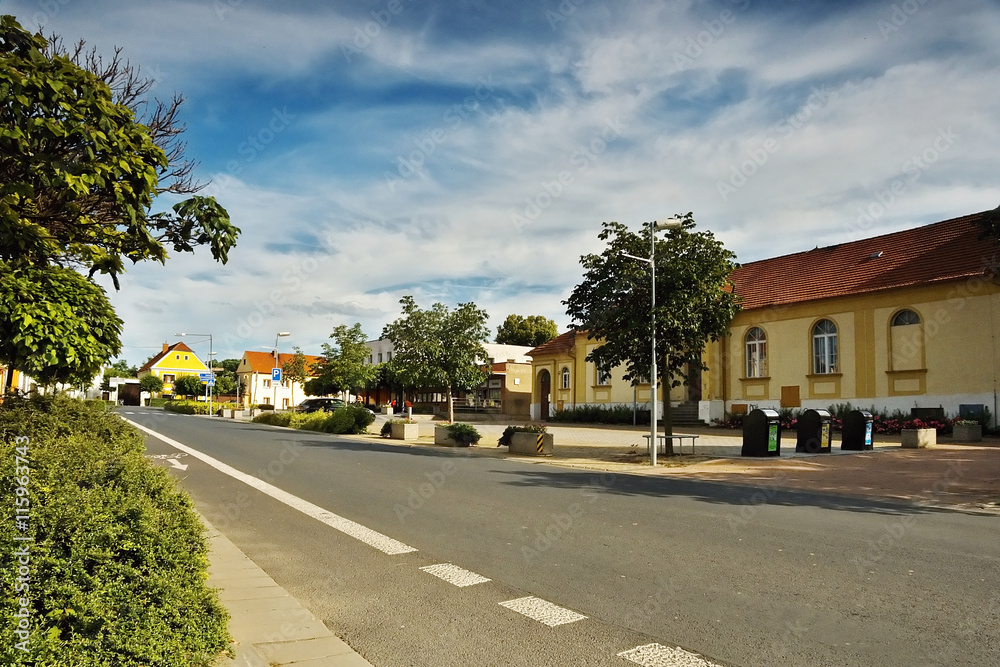 2016/07/07 Brozany nad Ohri, Czech republic - main road in the village Brozany nad Ohri  leaders around the square Palackeho namesti with parking during the summer tourist season