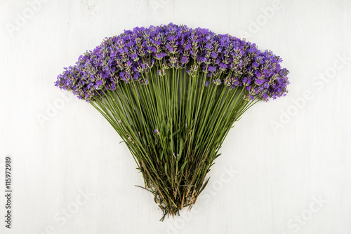 Fototapeta Naklejka Na Ścianę i Meble -  frame of lavender on a white wooden background