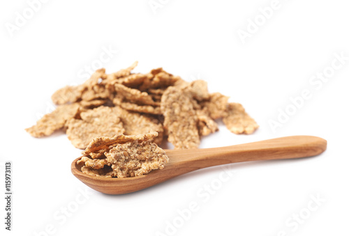 Pile of wholegrain cereal flakes isolated