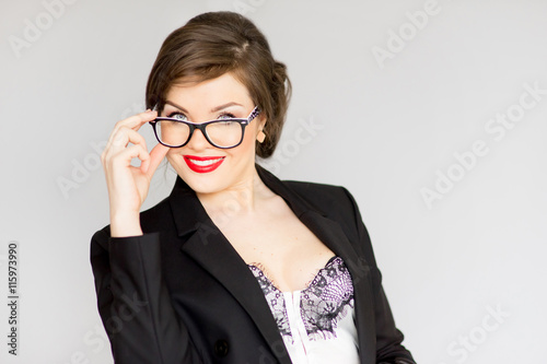 girl in a business suit and glasses