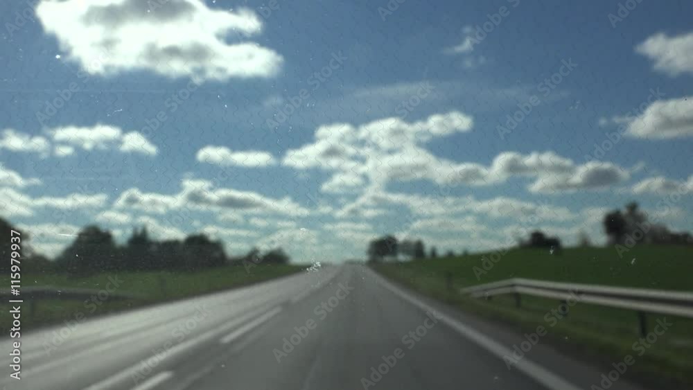 car driving on asphalt road at country. Focus on windscreen. 4K car driving on asphalt road at country. Focus on windscreen. 4K