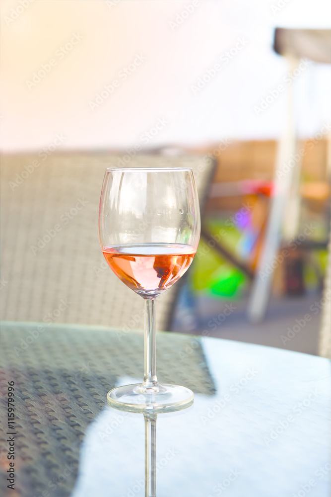 a glass of champagne at a party a glass of champagne at a party