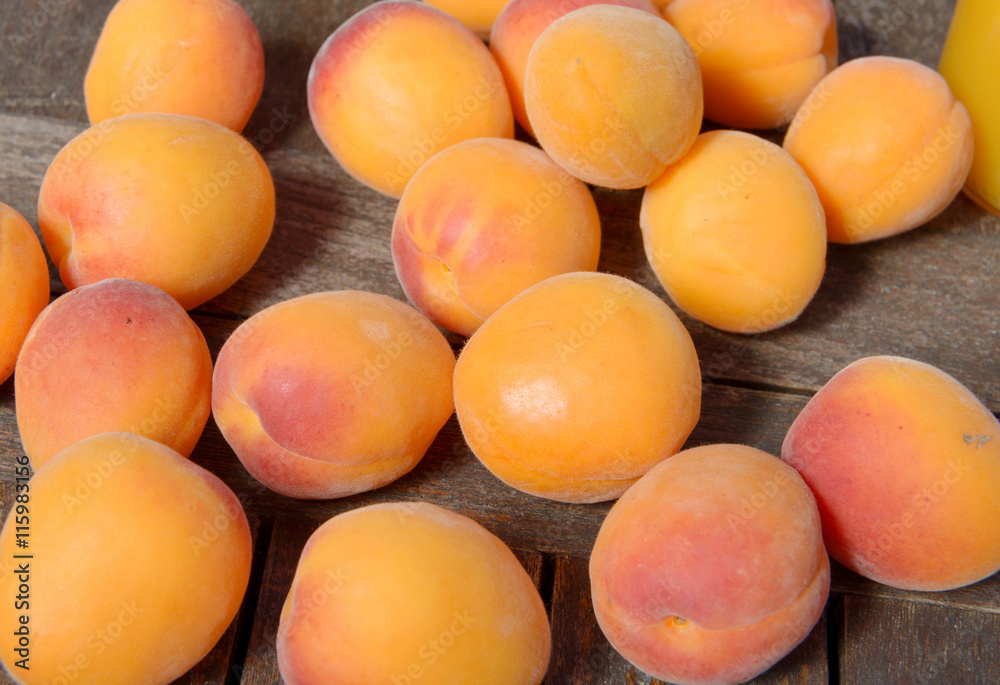 Apricots on the wooden table Apricots on the wooden table