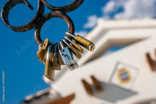 Some padlocks of the love in bronze and silver