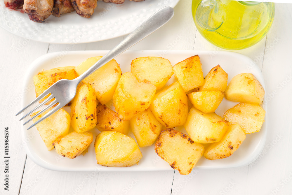 overhead make tray fried whole potatoes on white wooden overhead make tray fried whole potatoes on white wooden