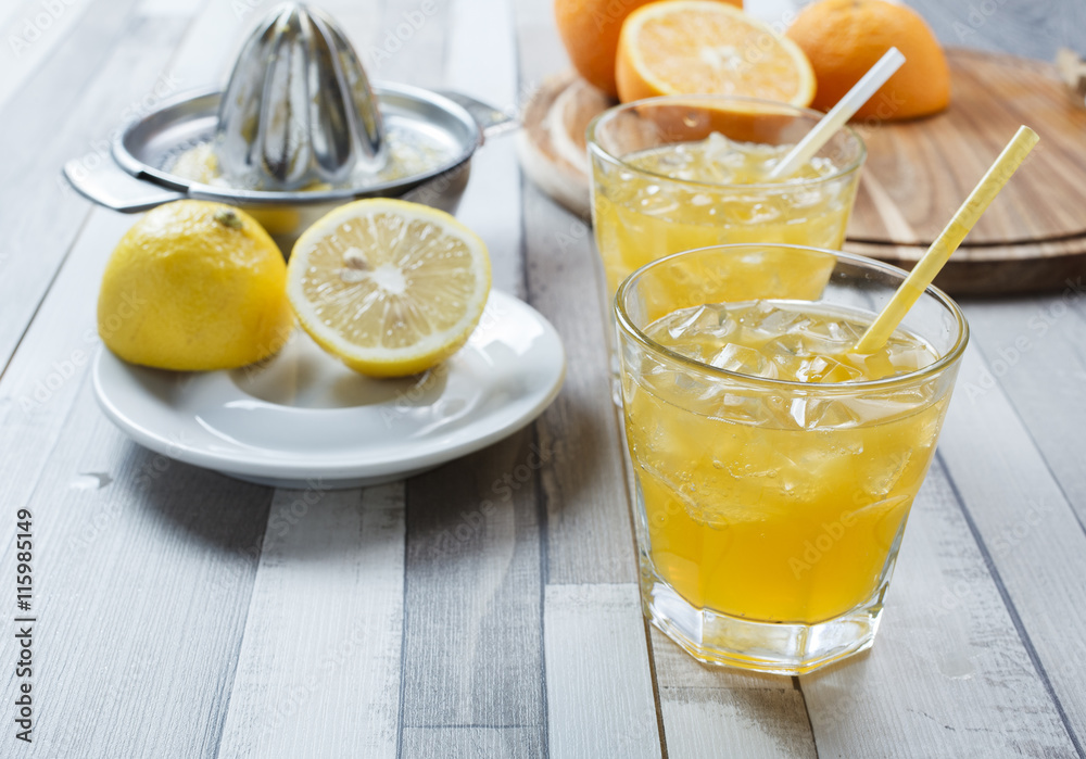 The cooled drink with fresh lemon and orange The cooled drink with fresh lemon and orange