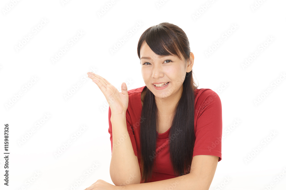 案内する笑顔の女性 案内する笑顔の女性