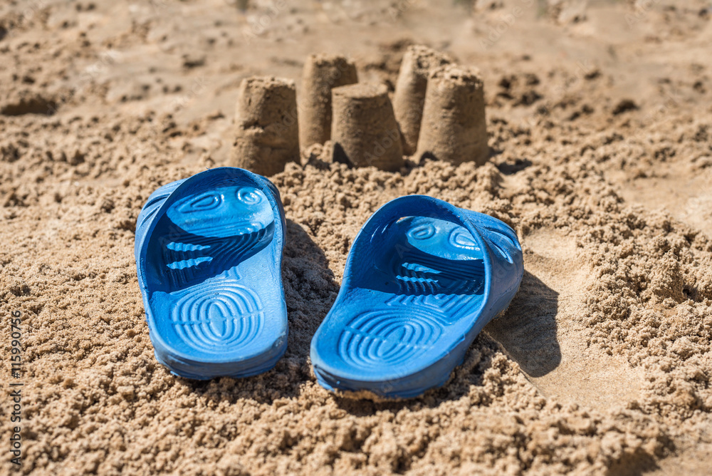 beach slippers on the sea coast beach slippers on the sea coast