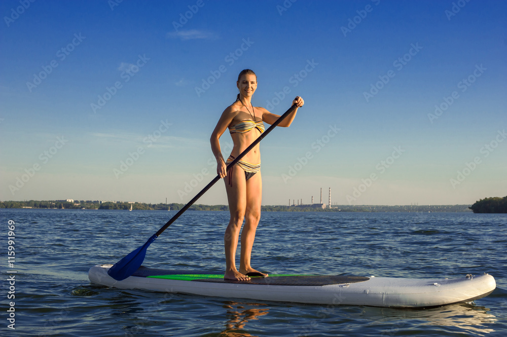 SUP stand up paddle board woman paddle boarding11