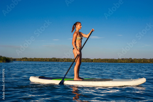 SUP Stand up paddle board woman paddle boarding10
