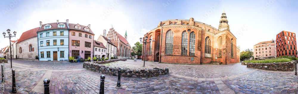 Skyline of Riga old Town. Small Square with Old houses near the St. Peter and St. John's Churches. Panoramic montage of 41 HDR image