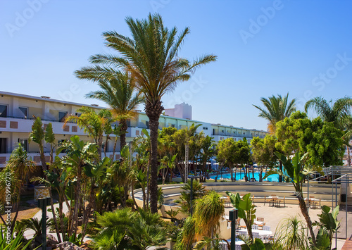 palm trees and green spaces in the resort of European modern hotel