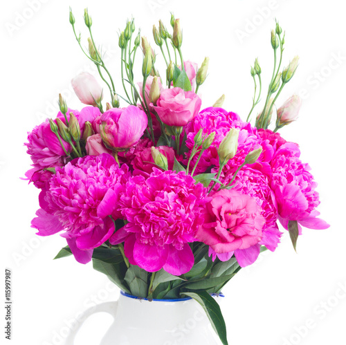 Bright pink peony and eustoma flowers bouquet close up isolated on white background