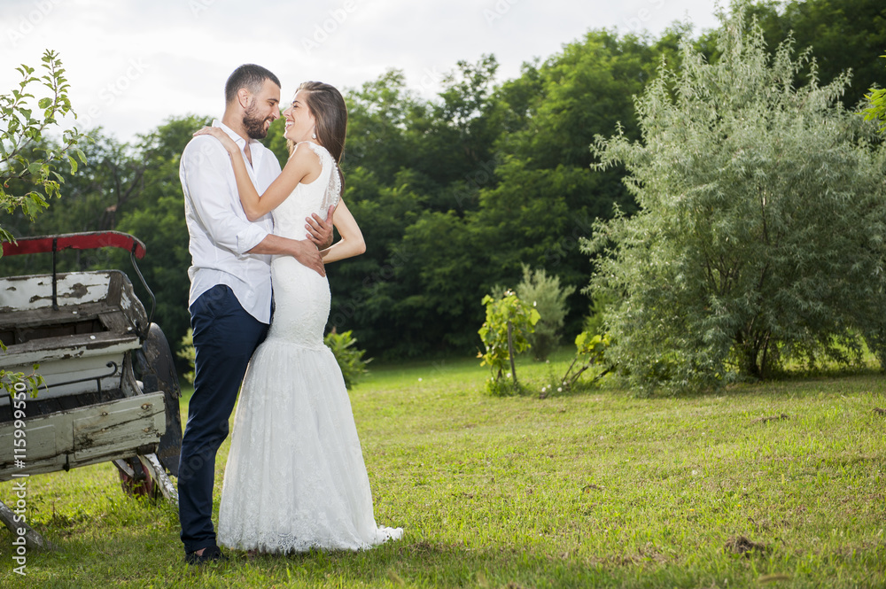 Happy bride and groom on their wedding. Wedding couple outdoor Happy bride and groom on their wedding. Wedding couple outdoor