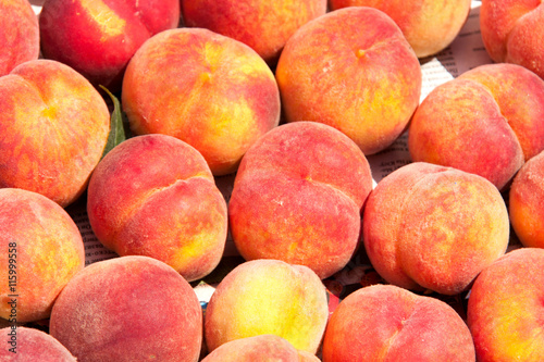 peaches on the counter market as a background