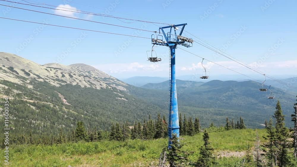 Chairlift, scenic view from high mountain, summer landscape Chairlift, scenic view from high mountain, summer landscape