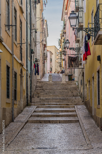 Narrow street in Bairro Alto, Lisbon, Portugal © tomeyk