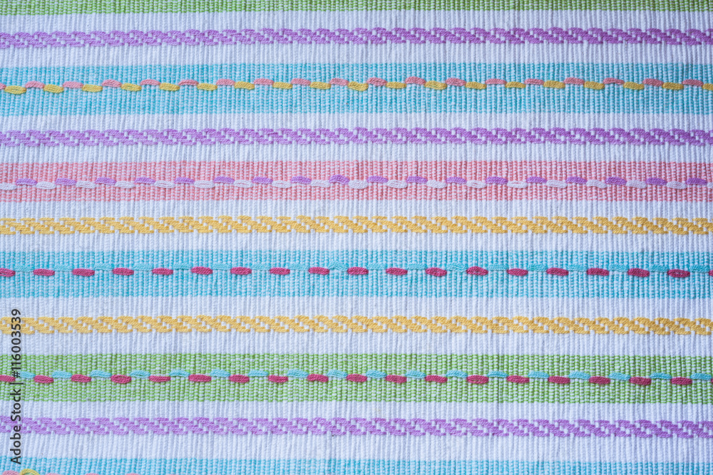 Close up view of colorful fabric tablecloth with stripe line Close up view of colorful fabric tablecloth with stripe line