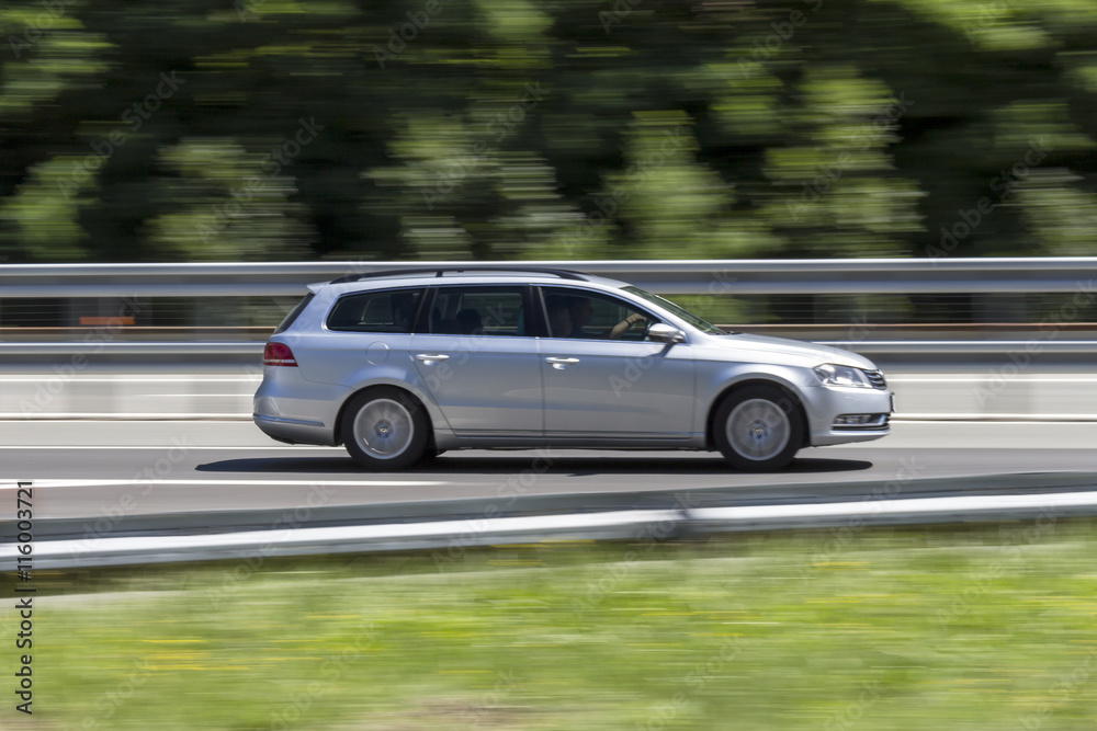 car in fast motion with panning effect on highway