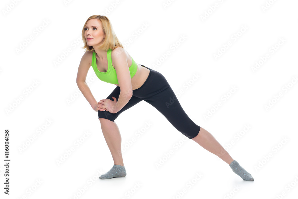 Beautiful middle aged woman doing sport exercise Beautiful middle aged woman doing sport exercise