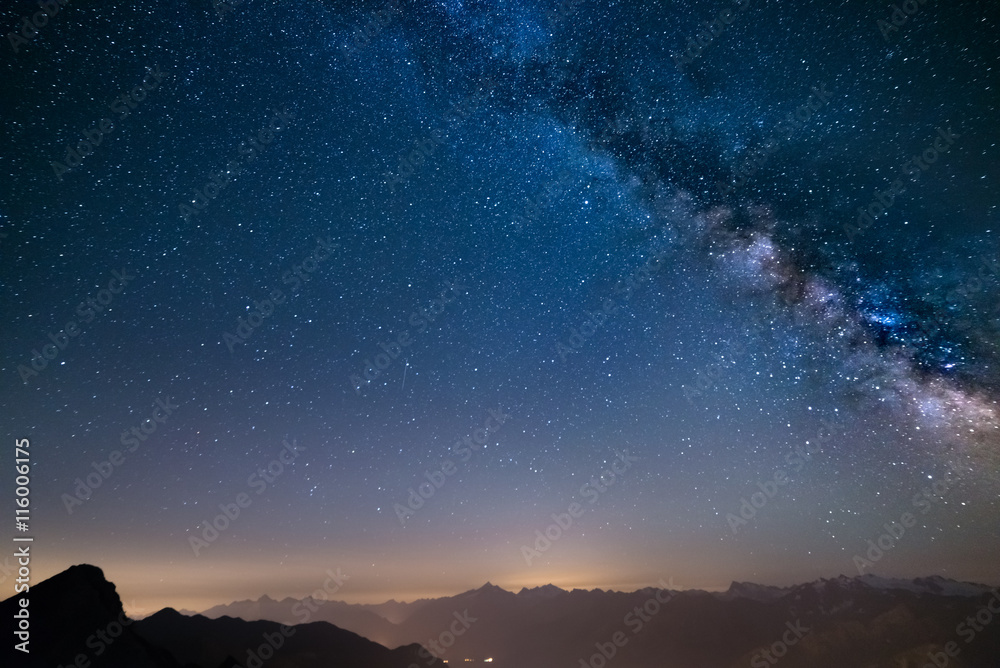 Fototapeta premium Glowing Milky Way and starry sky from the Alps