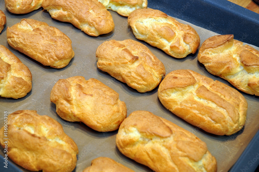 many eclairs cakes closeup many eclairs cakes closeup