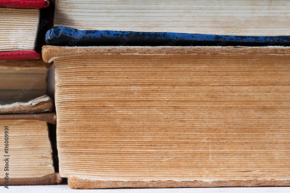 Stack of hardback books, close-up. Back to school. Copy space