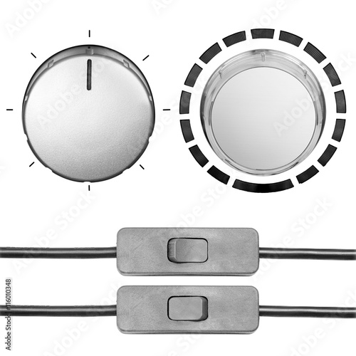 Isolated set of real world control switches and buttons. Metal, black and white.