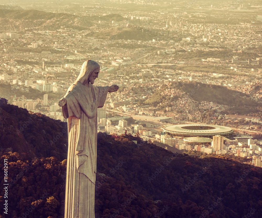 Aerial view of Christ Statue looking at Maracana Stadium - obrazy, fototapety, plakaty 