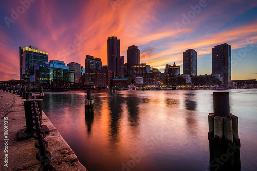 The downtown skyline at sunset, seen from Fort Point in Boston,