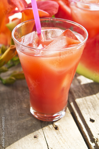 watermelon juice on wooden background