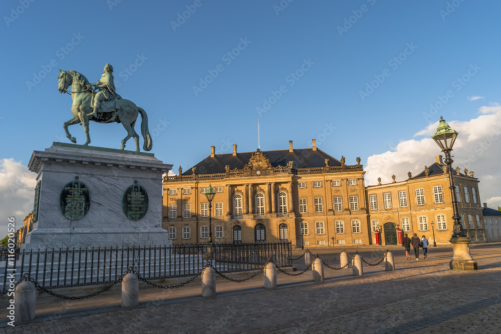 Amalienborg and Frederik V on Horseback illuminated in early mor