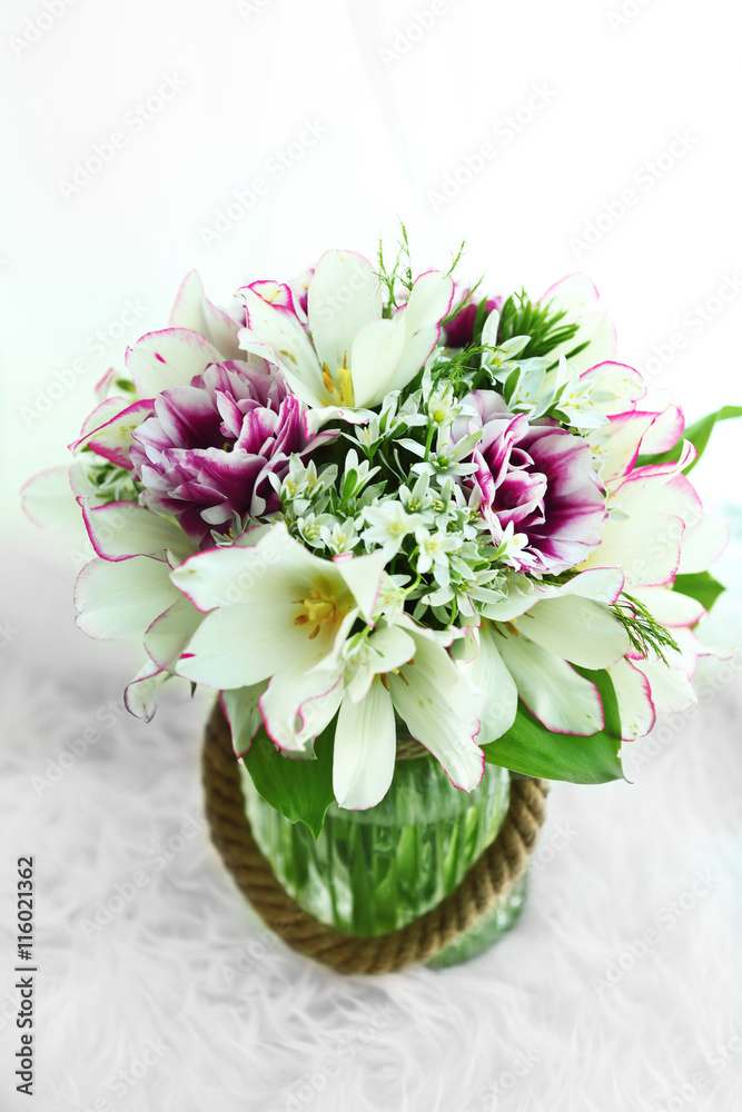 Bouquet of spring flowers on carpet Bouquet of spring flowers on carpet