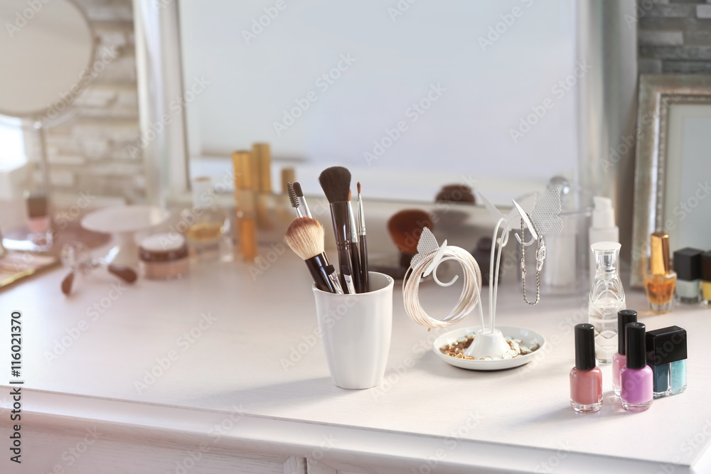 Cosmetic set on light dressing table Cosmetic set on light dressing table