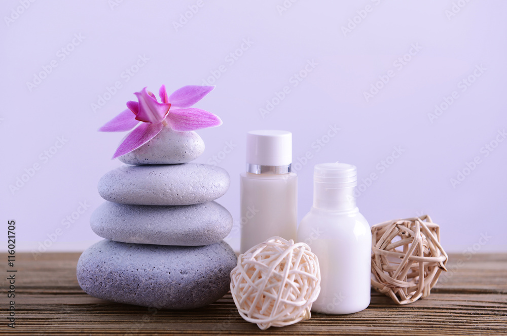 Fototapeta premium Spa composition with white stones on light background