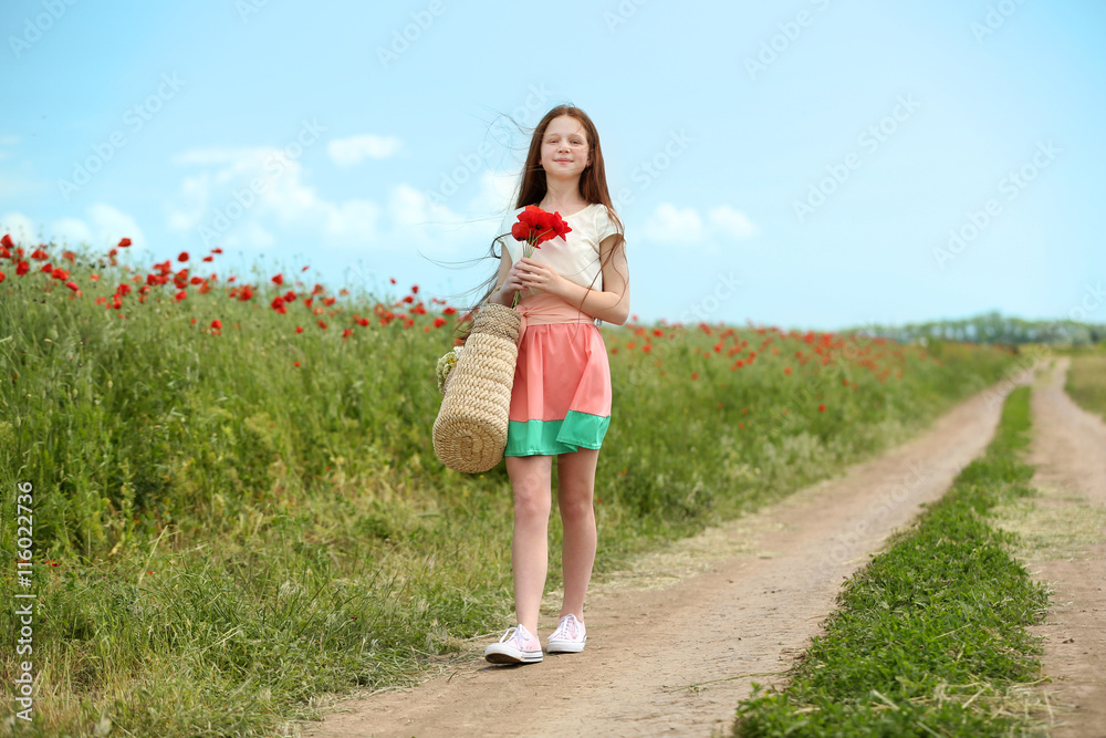 Beautiful girl in poppy field Beautiful girl in poppy field