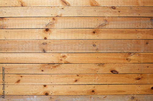 Yellow rough wooden wall