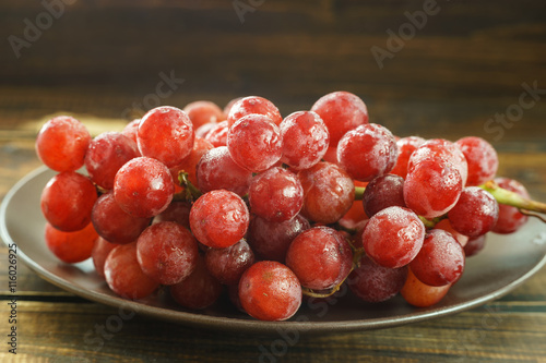 Bunch of red grapes on dark background