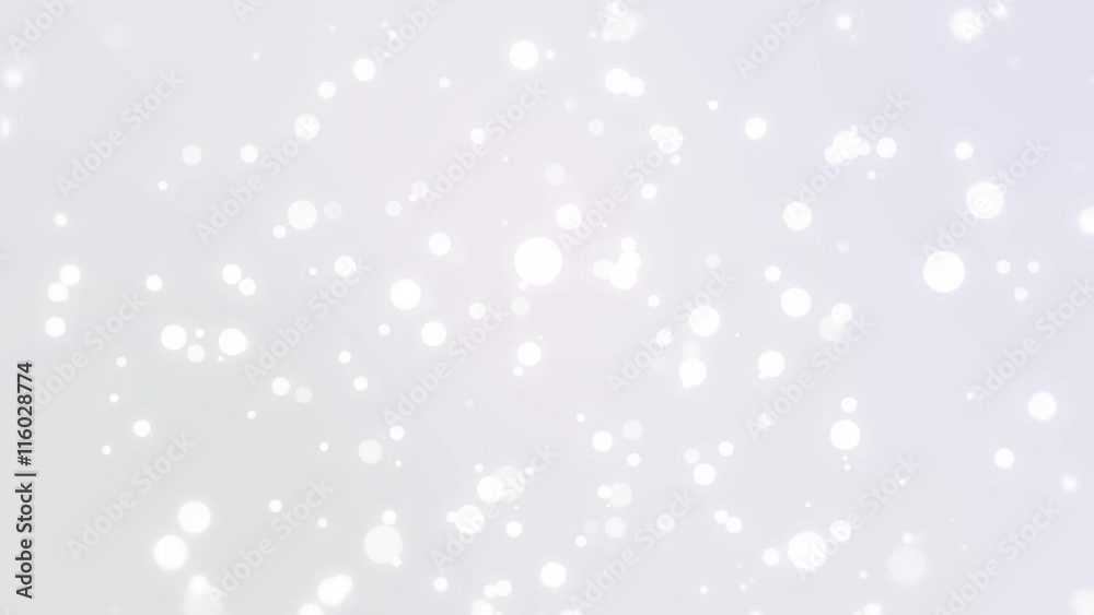 Sparkly light particles falling down a silver white gradient background Sparkly light particles falling down a silver white gradient background