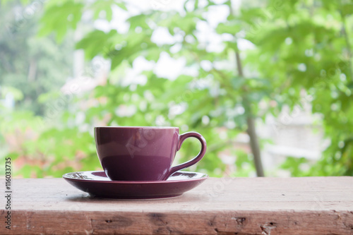 Purple coffee cup on tabletop