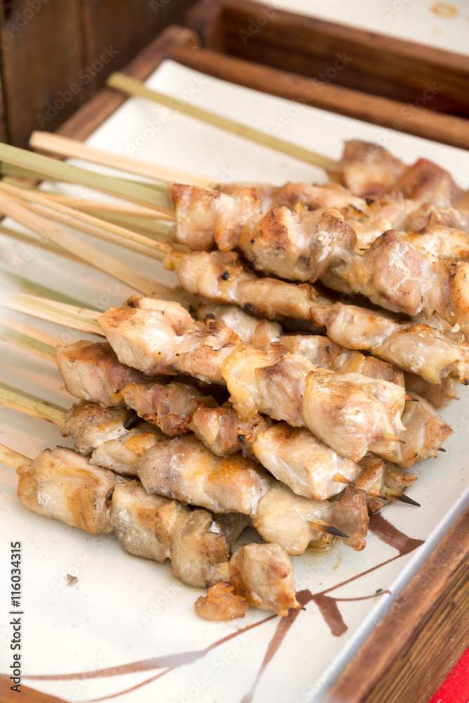 thai style grill pork in bamboo stick