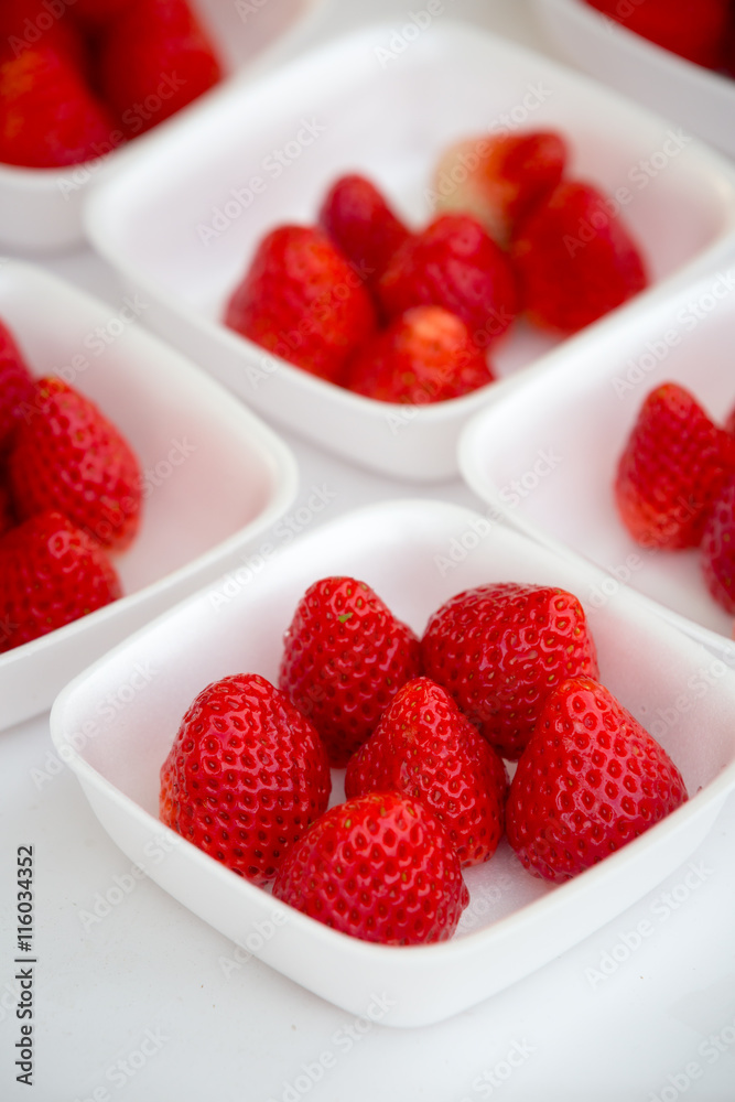 fresh juicy strawberry in a white bowl fresh juicy strawberry in a white bowl