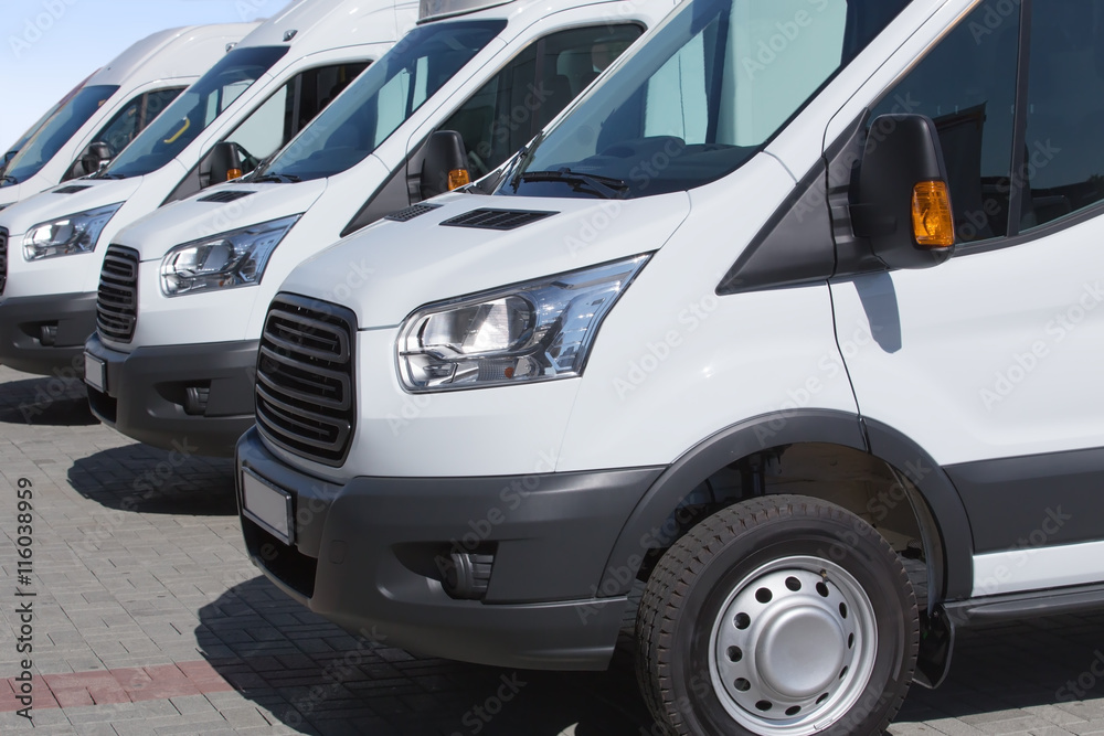 minibuses and vans outside