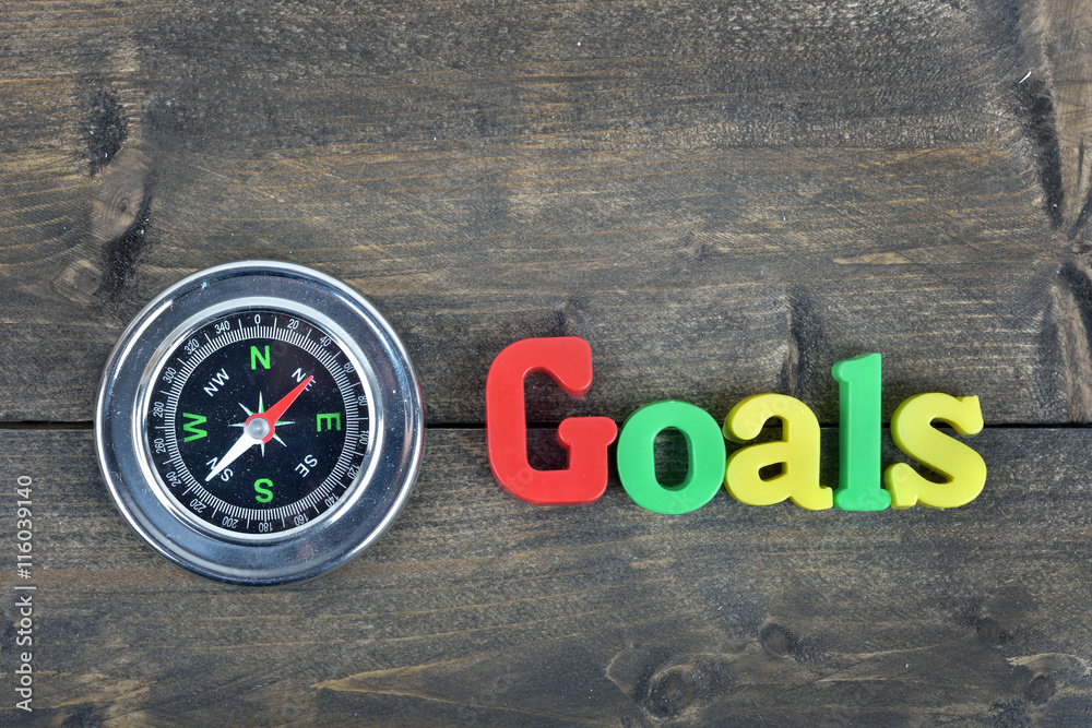 Goals on wooden table Goals on wooden table