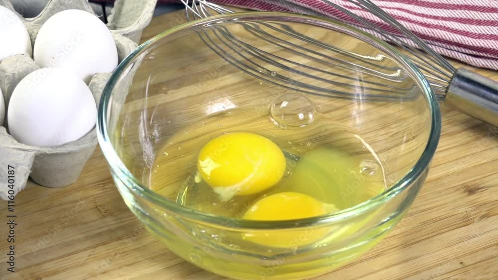 Beating eggs in a glass bowl
Beating eggs in a glass bowl
