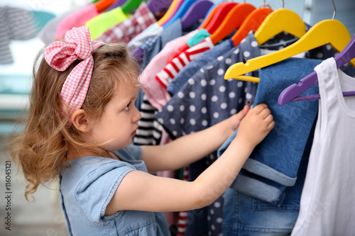 Cute baby girl in baby shop...