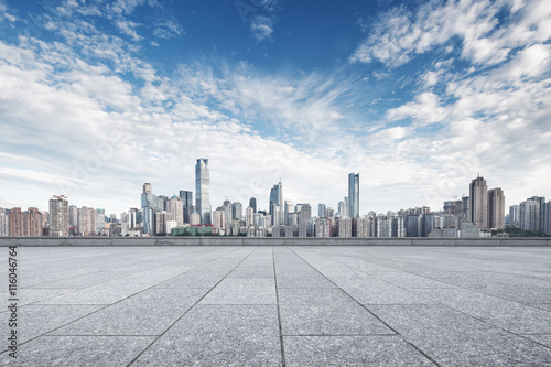 empty floor with cityscape and skyline of chongqing in clous sky