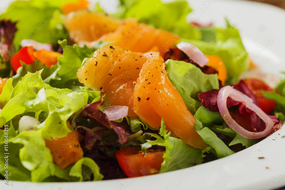 Fresh salad with smoked salmon.